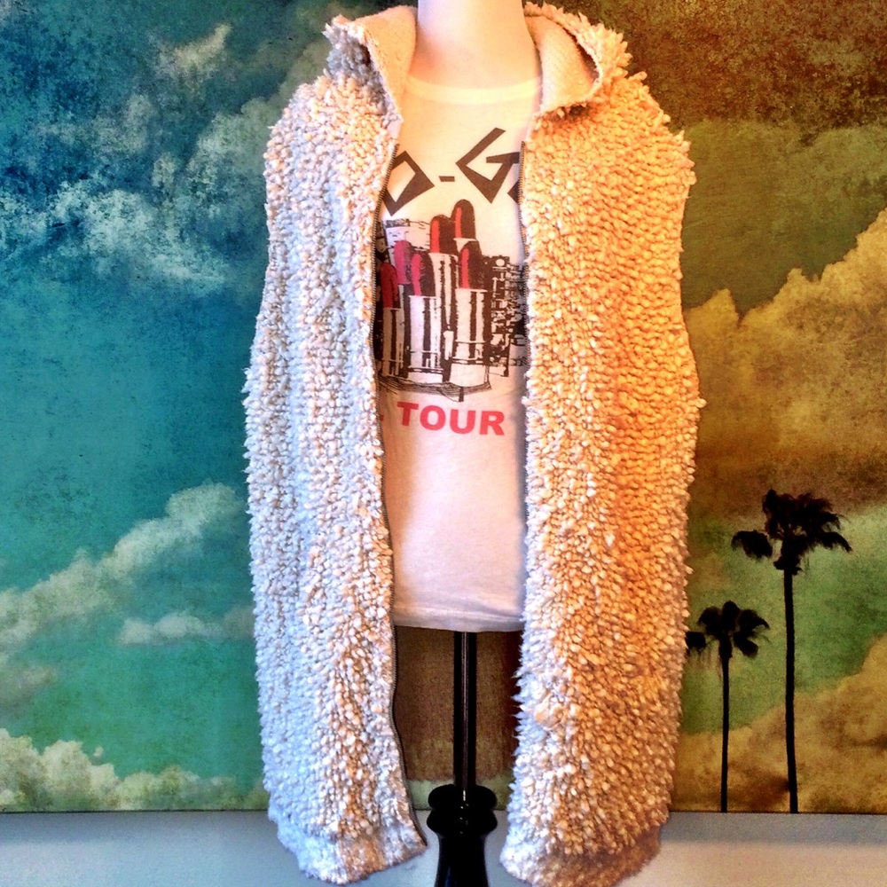 Free People oversized furry hooded vest.
